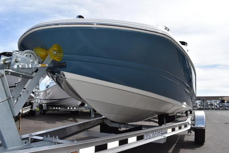 Slide: The Image of 2024 Stingray 182SC boat on a trailer, front view. - 45
