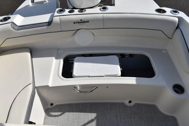 Slide: The Image of 2024 Stingray 191DC boat interior with storage compartment. - 15