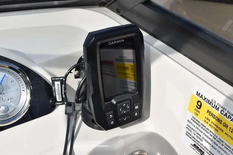 Slide: The Image of Garmin GPS on 2024 Stingray 191DC boat dashboard. - 21