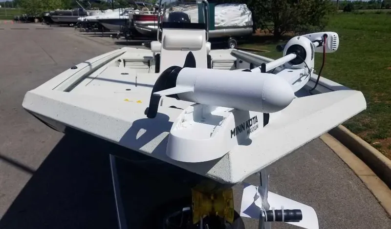 Slide: The Image of 2024 Ranger RB210 boat with Minn Kota trolling motor on trailer. - 4