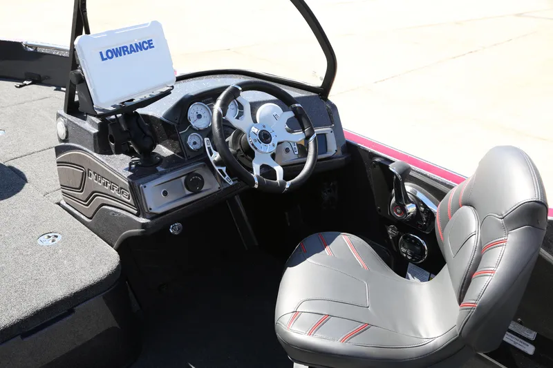 Slide: The Image of 2024 Nitro ZV21 boat cockpit with Lowrance electronics and modern steering wheel. - 4