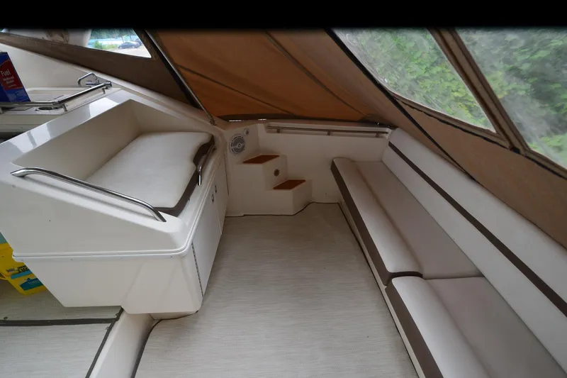 Slide: The Image of Interior of 1996 Wellcraft Portofino 43 boat with seating and storage. - 10