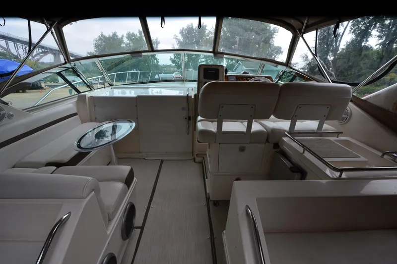 Slide: The Image of Interior of 1996 Wellcraft Portofino 43 yacht, featuring plush seating and sleek design. - 29