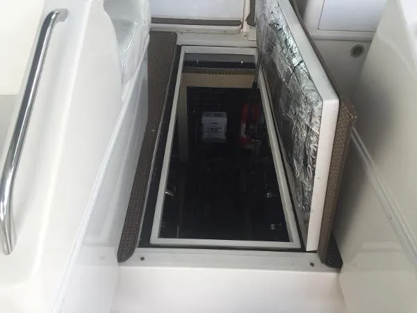 Slide: The Image of Open engine compartment of 1996 Wellcraft Portofino 43 boat, showcasing interior components. - 3