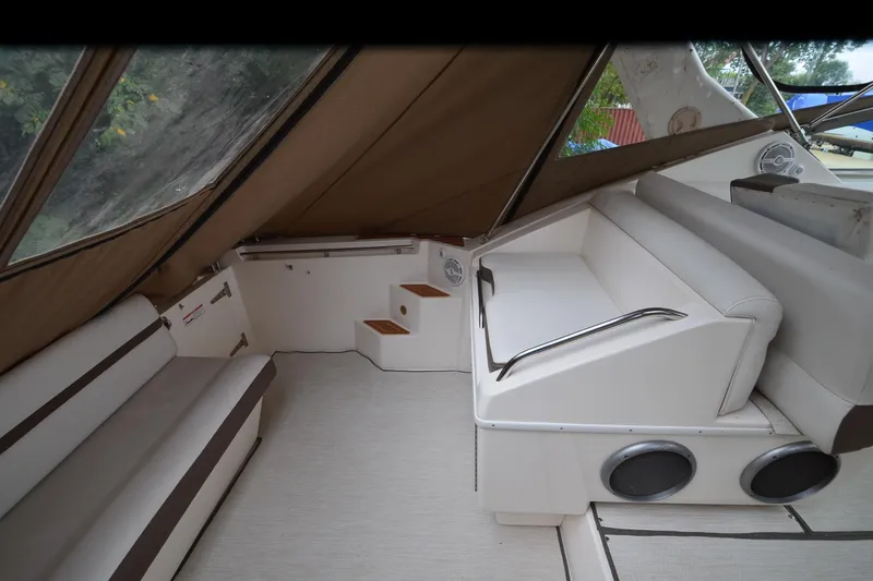 Slide: The Image of Interior of 1996 Wellcraft Portofino 43 yacht with seating and speakers. - 9