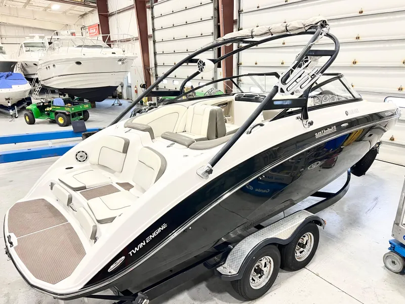 Slide: The Image of 2014 Yamaha Boats 242 Limited S on trailer in indoor storage facility. - 1