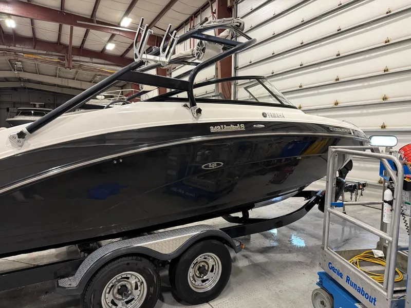 Slide: The Image of 2014 Yamaha Boats 242 Limited S on trailer in indoor storage facility. - 3