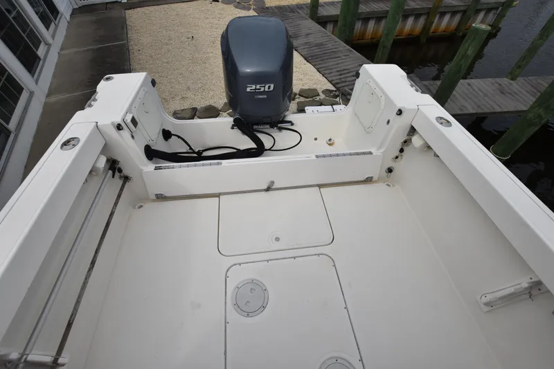 Slide: The Image of 1994 Pursuit 2350 boat deck with Yamaha 250 outboard motor. - 12