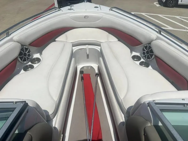 Slide: The Image of Interior of 2016 Crownline Boats 21SS with white and red seating. - 12