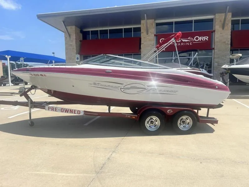 Slide: The Image of 2016 Crownline Boats 21SS on trailer, pre-owned, displayed at dealership. - 2