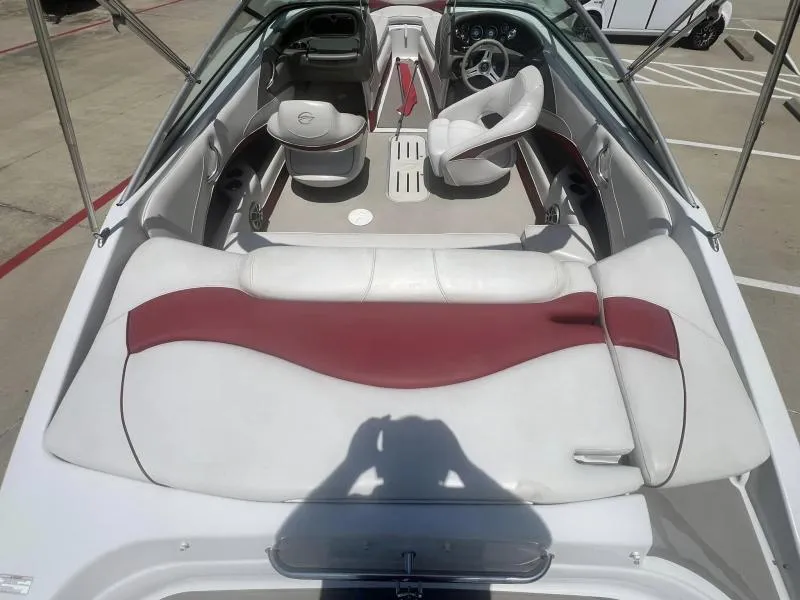 Slide: The Image of 2016 Crownline Boats 21SS interior with white and red seating. - 9