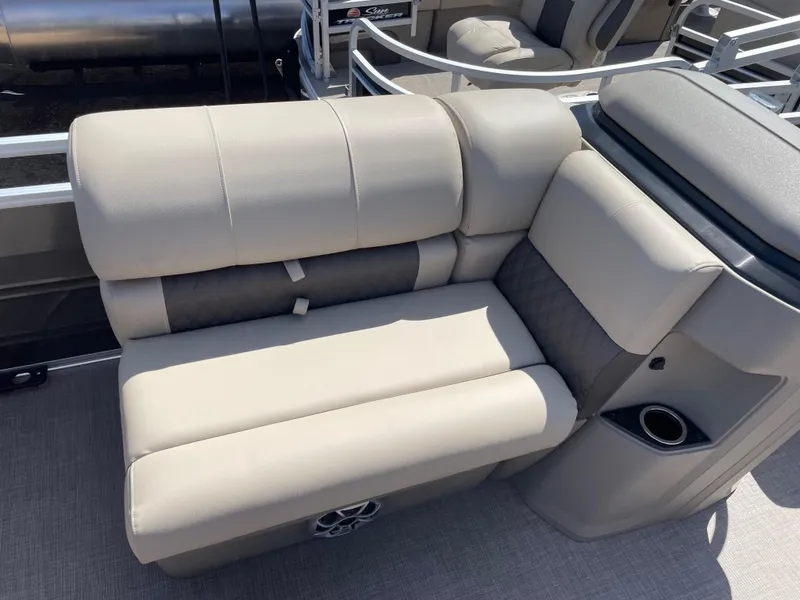 Slide: The Image of 2024 Sun Tracker Fishin' Barge 22 DLX comfortable seating with cup holder. - 8