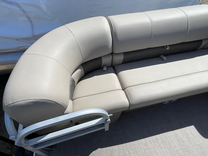 Slide: The Image of 2023 Sun Tracker SportFish 20 DLX pontoon boat seating area. - 5