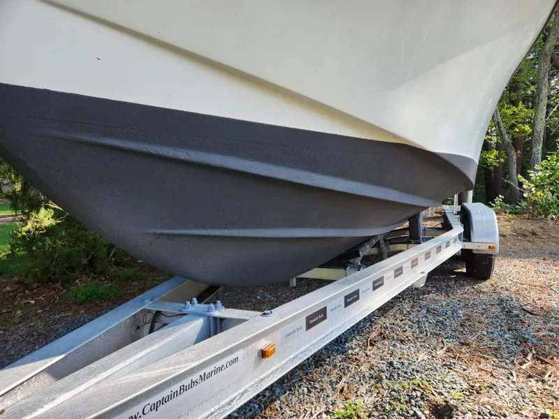 Slide: The Image of 2006 Blue Fin Pro Fish C/C boat on trailer, side view. - 12