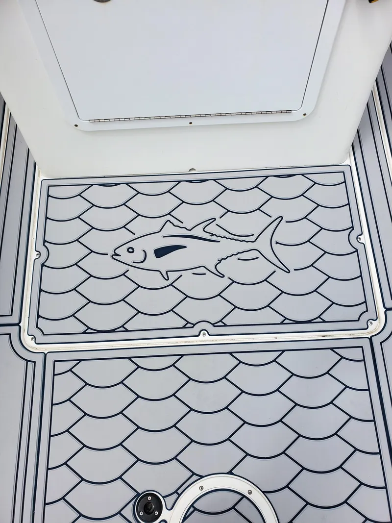 Slide: The Image of Deck of 2006 Blue Fin Pro Fish C/C boat with fish design. - 18