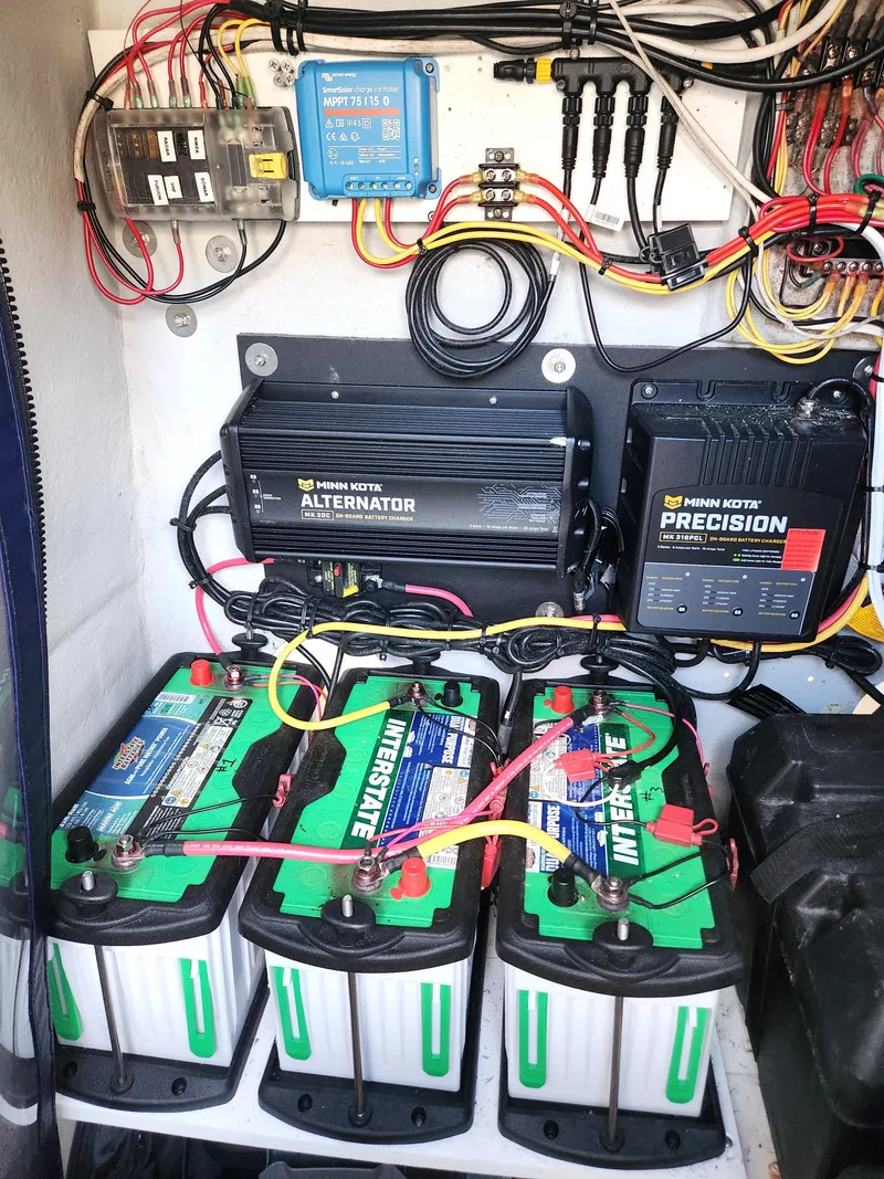 Slide: The Image of 2006 Blue Fin Pro Fish C/C boat battery setup with alternator and precision charger. - 29