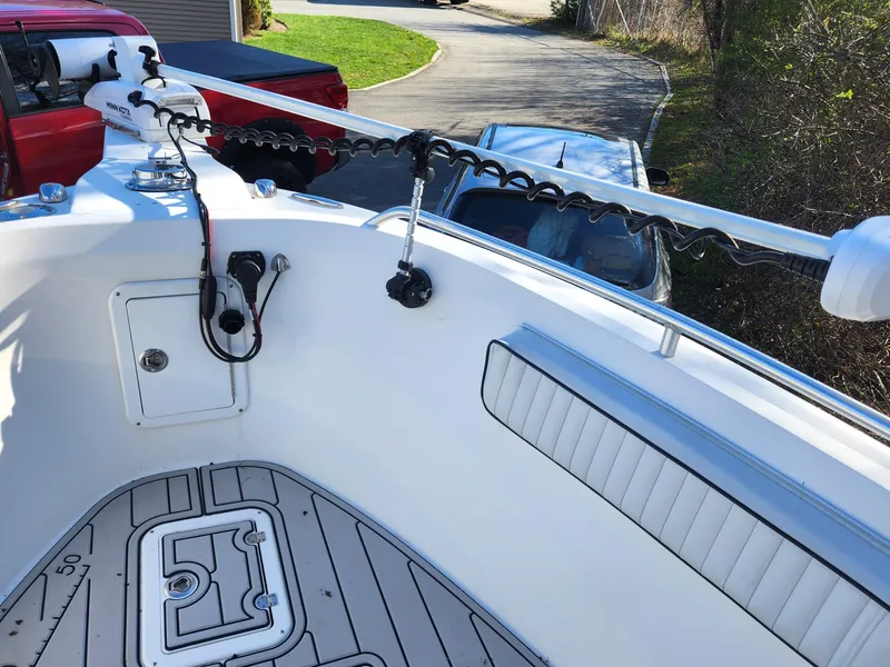 Slide: The Image of 2006 Blue Fin Pro Fish C/C boat deck with seating and equipment. - 36