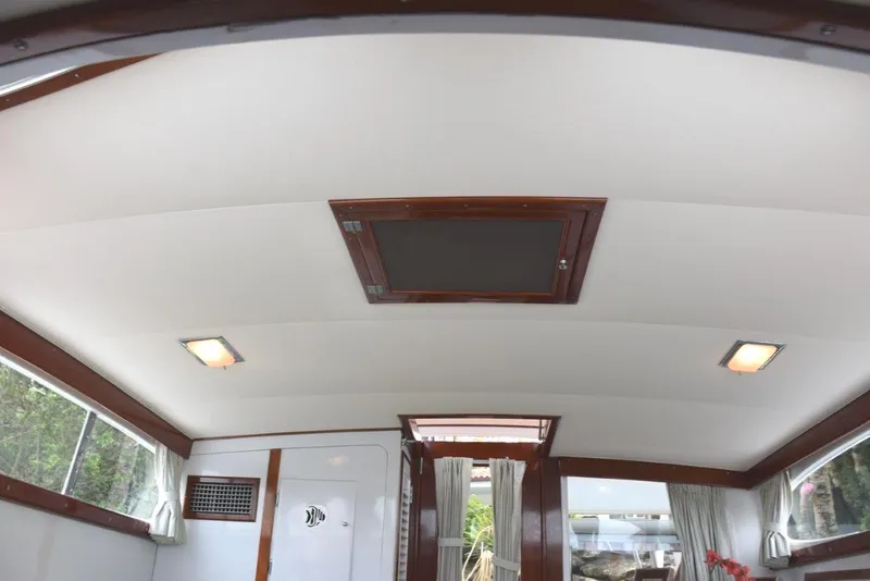 Slide: The Image of Salon headliner with lights and deck hatch - 18