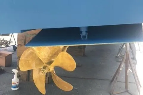 Slide: The Image of 5 blade props and trim tabs - 49