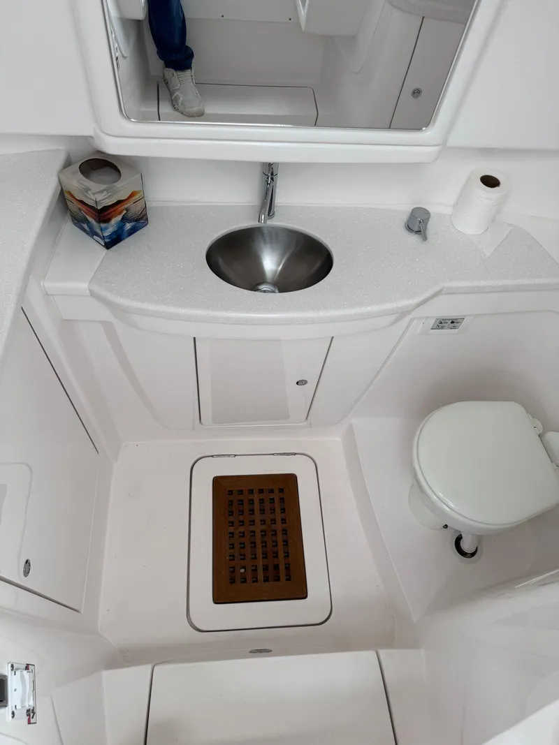 Slide: The Image of 2023 Intrepid 427 Nomad FE bathroom with sink, toilet, and storage. - 23