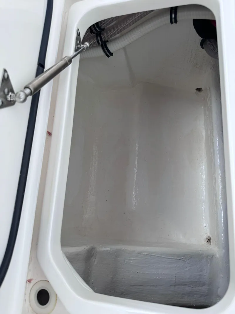 Slide: The Image of 2023 Intrepid 427 Nomad FE storage compartment. - 24