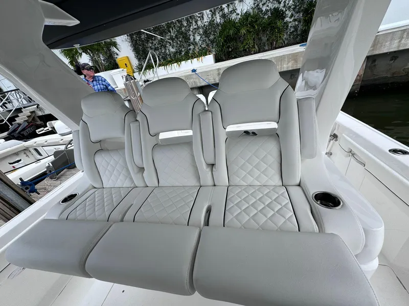 Slide: The Image of 2023 Intrepid 427 Nomad FE luxury boat seating with diamond-stitched upholstery. - 6