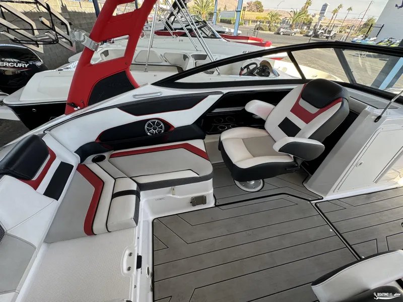 Slide: The Image of 2020 Yamaha Boats 212X interior with sleek seating and modern design. - 10