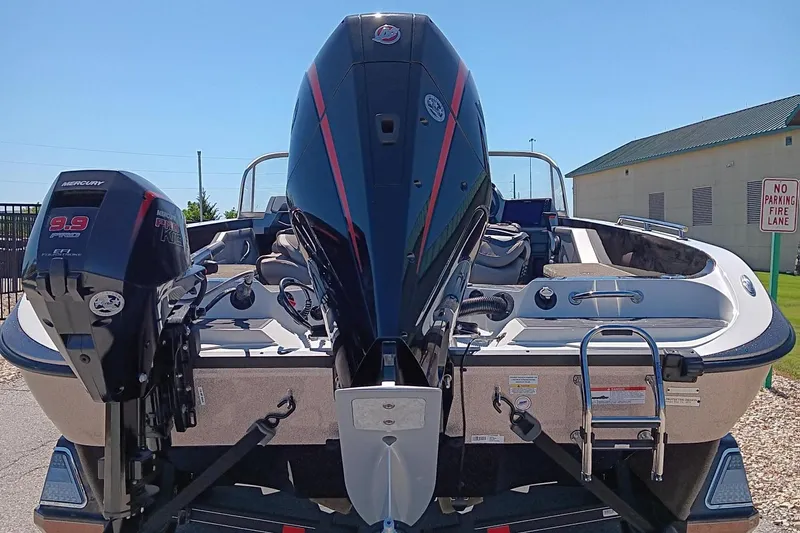 Slide: The Image of 2024 Ranger 621FS Ranger Cup Equipped boat with dual outboard motors. - 3