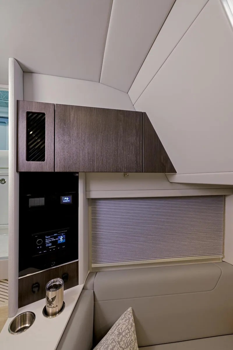 Slide: The Image of Interior cabin of 2025 Formula 457 Center Console Sport boat with modern cabinetry. - 13