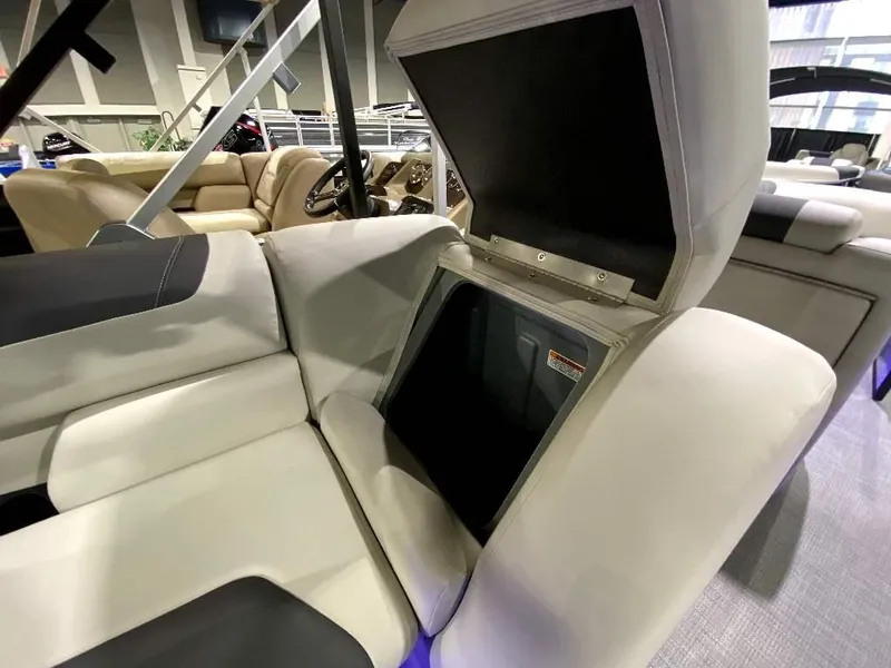 Slide: The Image of 2024 SunChaser GENEVA 22 SB boat interior with open storage compartment. - 19