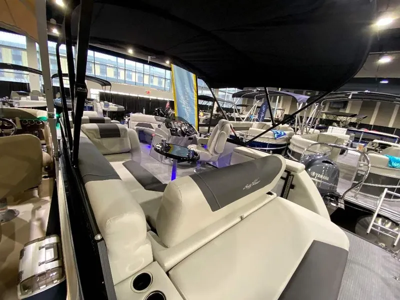 Slide: The Image of 2024 SunChaser GENEVA 22 SB pontoon boat interior at a boat show. - 3