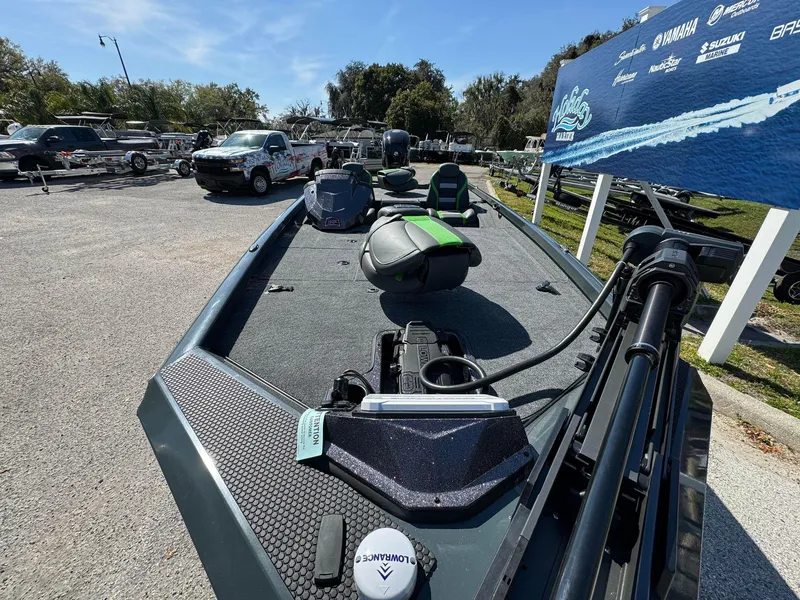 Slide: The Image of 2024 Ranger RT188P fishing boat on display at an outdoor dealership. - 6