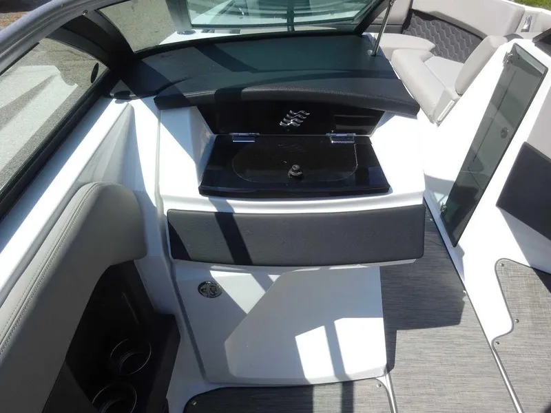 Slide: The Image of 2024 Four Winns H6 boat interior with sleek seating and modern design. - 22