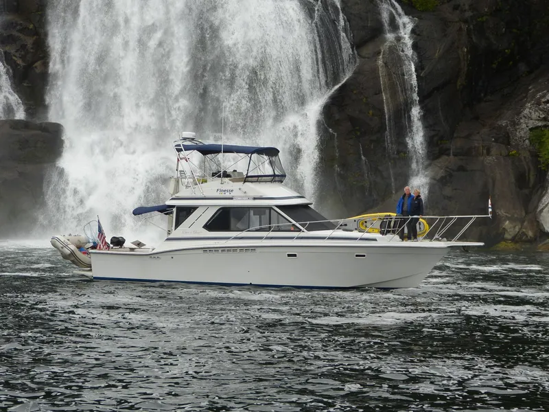 The Image of 1988 Chris-Craft 392 Commander near waterfall. - 0