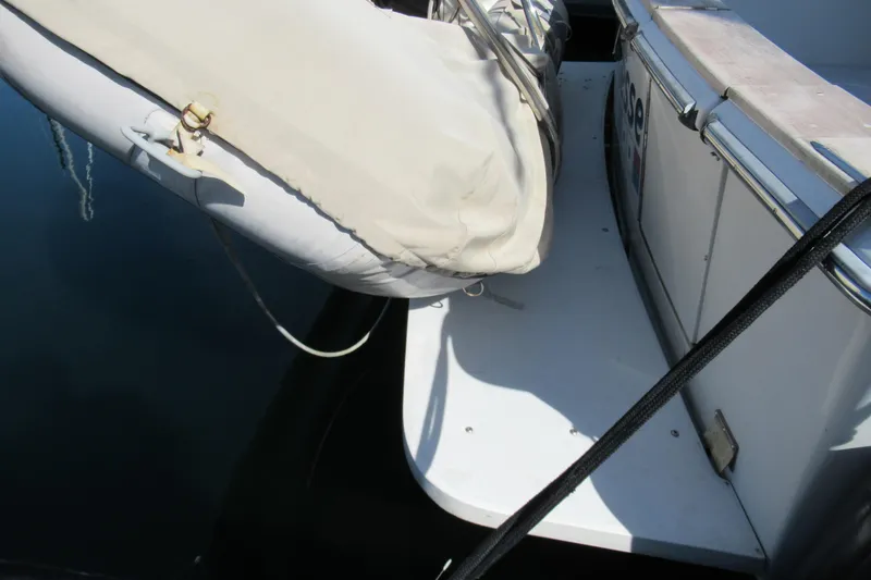 Slide: The Image of 1988 Chris-Craft 392 Commander boat with covered equipment on deck. - 32