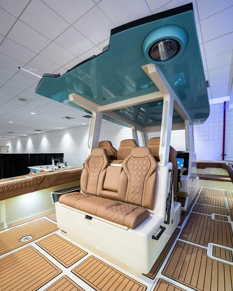 Slide: The Image of BlueCat 30 boat interior, 2025 model, featuring luxurious seating and modern design. - 2
