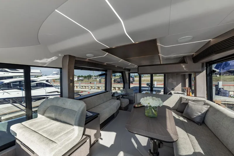 Slide: The Image of Luxurious interior of the 2024 Galeon 560 Fly yacht with modern furnishings. - 17