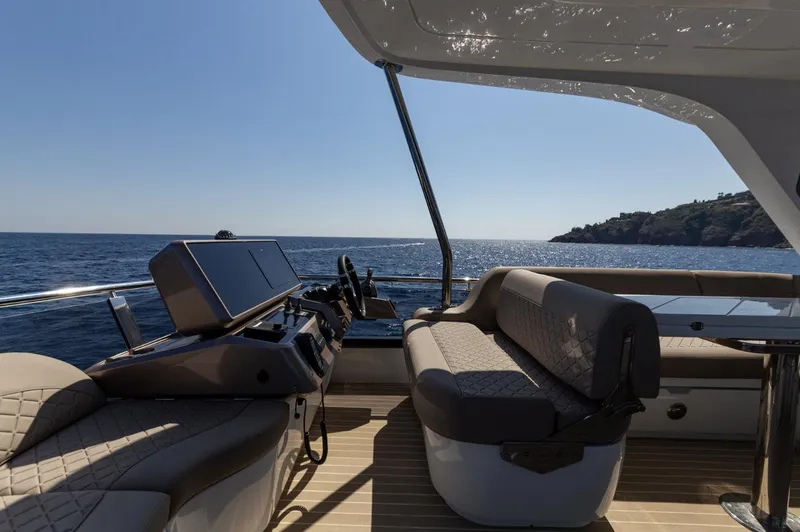 Slide: The Image of 2024 Galeon 560 Fly yacht interior with ocean view. - 9