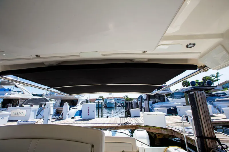 Slide: The Image of Boston Whaler 380 Realm 2019 model docked at a marina, view from the cockpit. - 19