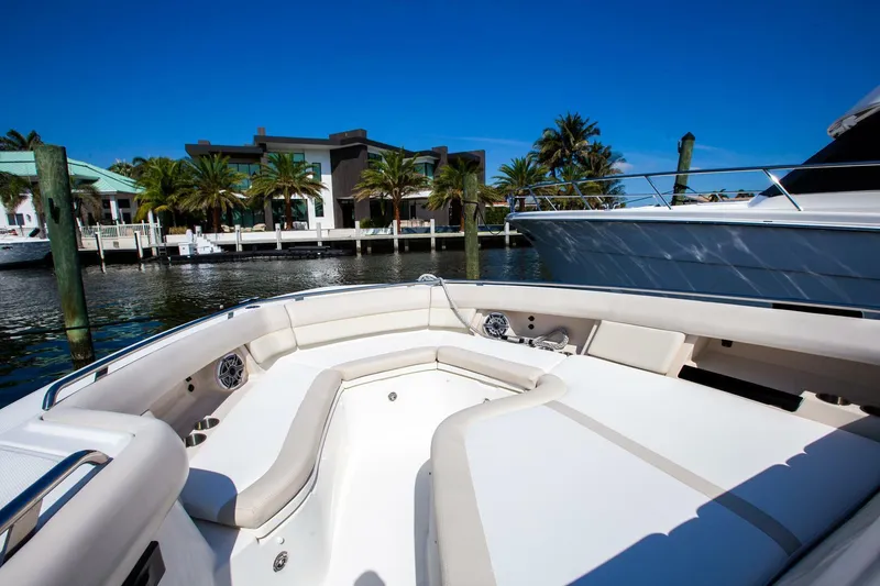 Slide: The Image of 2019 Boston Whaler 380 Realm boat interior with waterfront view. - 3