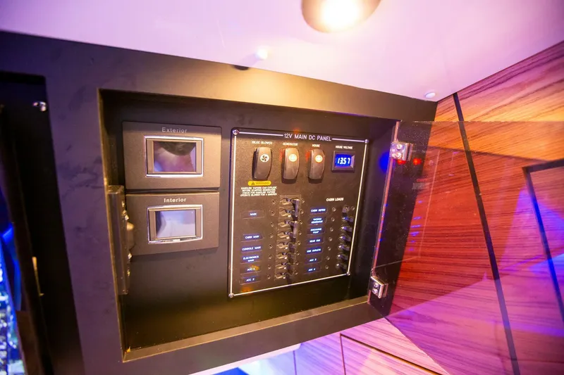 Slide: The Image of Electrical control panel on a 2019 Boston Whaler 380 Realm boat. - 33