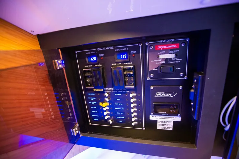 Slide: The Image of Electrical control panel of a 2019 Boston Whaler 380 Realm boat. - 34