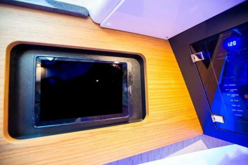 Slide: The Image of Control panel of 2019 Boston Whaler 380 Realm boat with touchscreen display. - 35