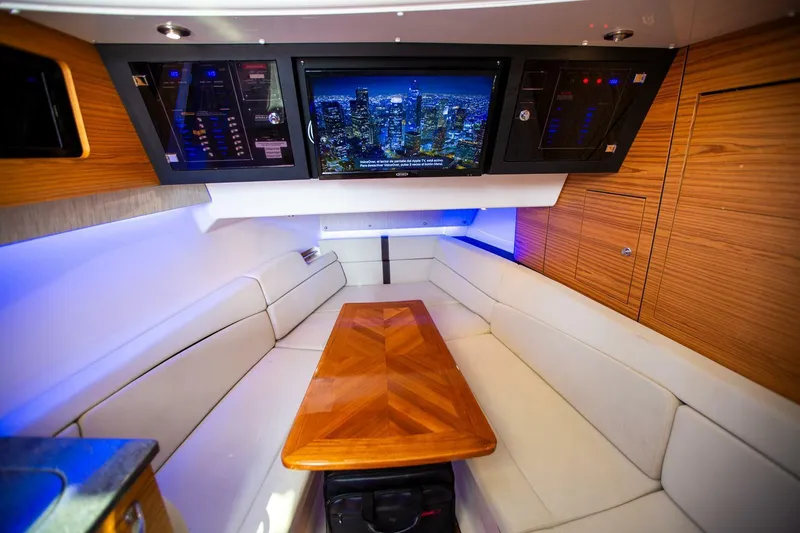 Slide: The Image of Luxurious interior of 2019 Boston Whaler 380 Realm with plush seating and entertainment system. - 37
