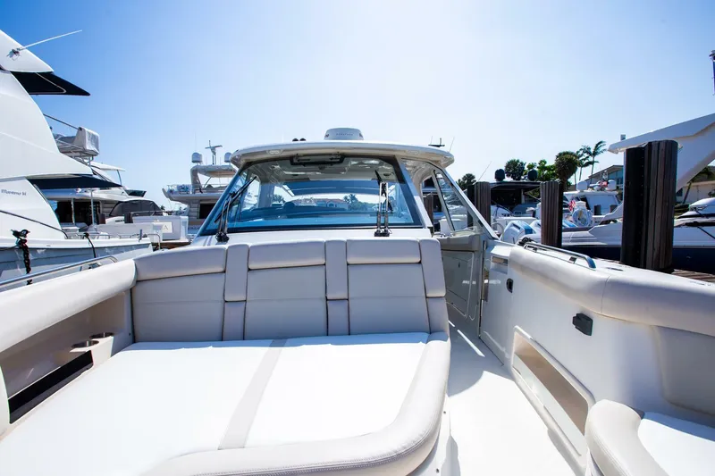 Slide: The Image of 2019 Boston Whaler 380 Realm luxury boat interior at marina. - 5