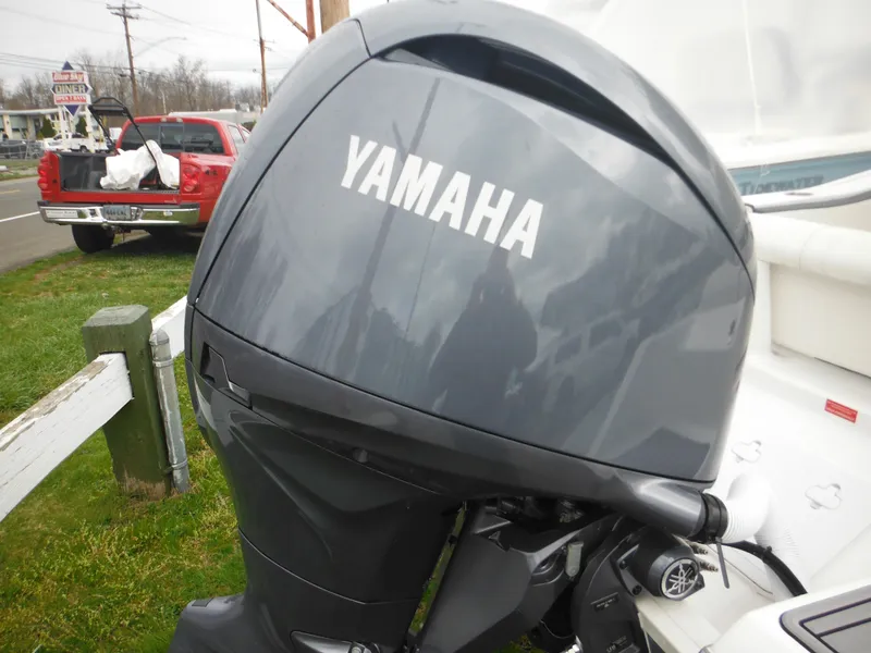 Slide: The Image of 2024 Tidewater 210 LXF boat with Yamaha outboard motor. - 10