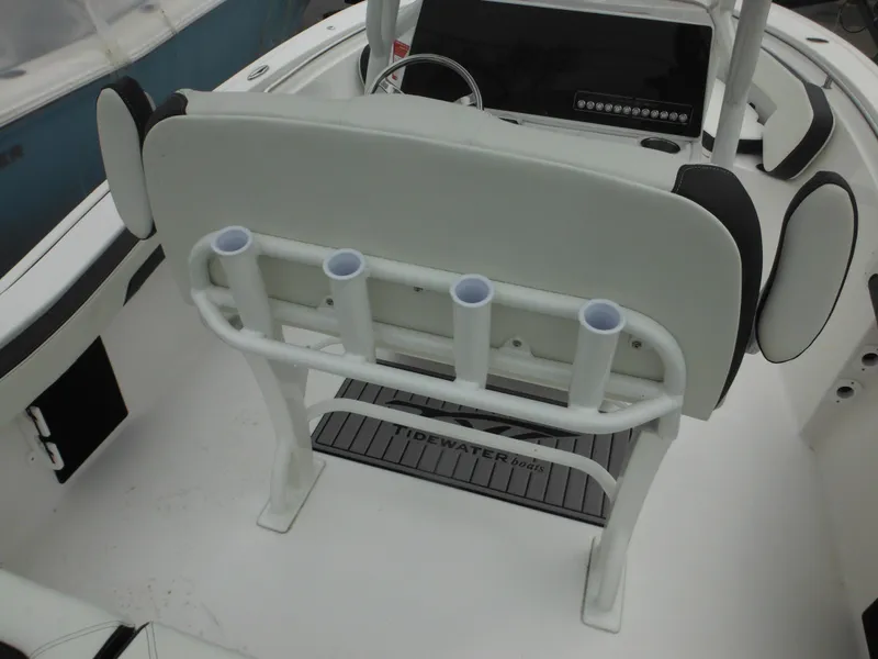 Slide: The Image of 2024 Tidewater 210 LXF boat interior with rod holders and seating. - 25