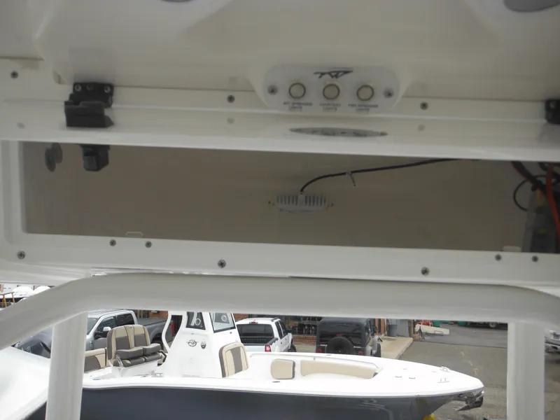 Slide: The Image of 2024 Tidewater 210 LXF boat interior and control panel. - 28