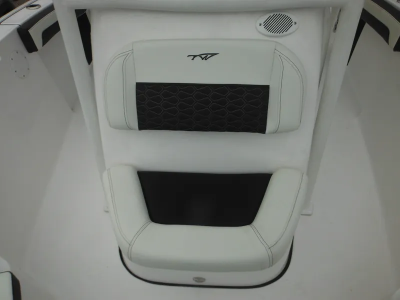 Slide: The Image of 2024 Tidewater 210 LXF boat seat with black and white upholstery. - 33