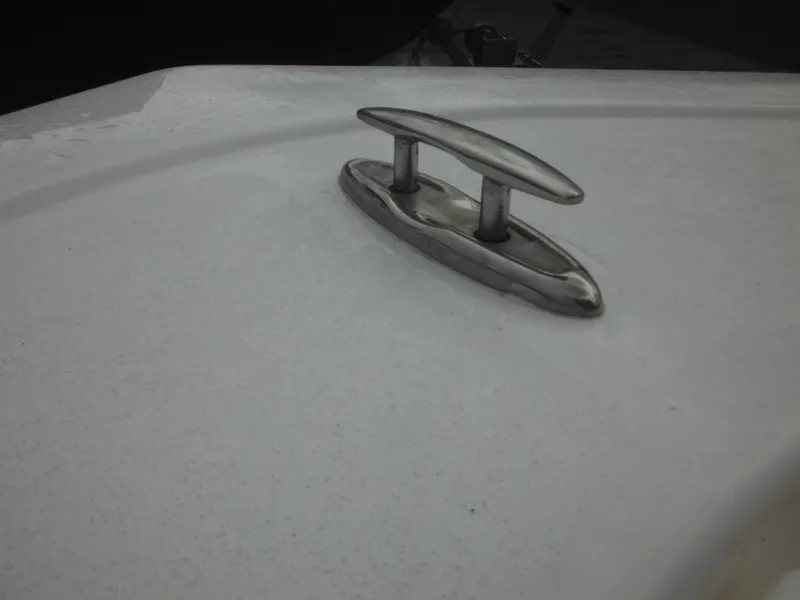 Slide: The Image of Close-up of a 2024 Tidewater 210 LXF boat cleat on a white deck. - 40